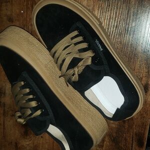 Black and tan platform sneakers